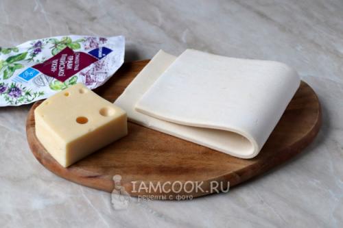 Сладкий и хрустящий: рецепт рулета из слоеного теста с поленом 10