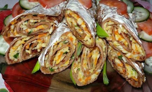 Тонкие очень вкусные печёночные блинчики с начинкой.

