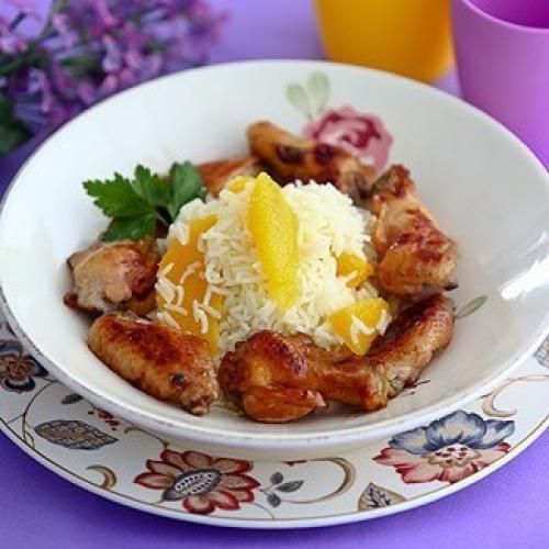 Куриные крылышки с рисом и апельсиновым маслом в мультиварке.
