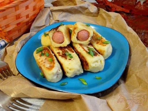 Сосиски в картофельно - сырной шубке.