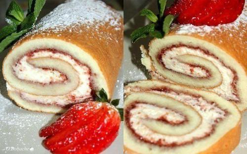 Бисквитный рулет с клубничным вареньем и взбитыми сливками.