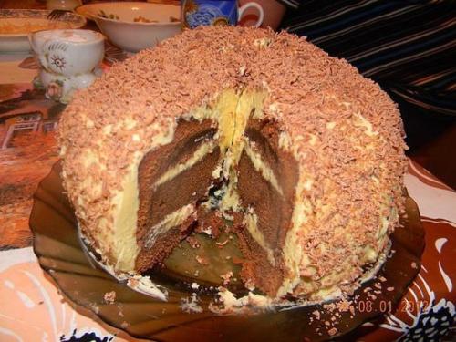 Торт - лентяй.  Масло 140 гр, сахар 140 гр, шоколад 200 гр, мука 120 гр, яйца 6 шт, способ приготовления: